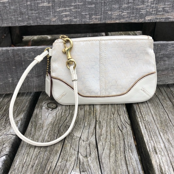 Coach Handbags - Coach Cream Signature Wristlet! VGUC!